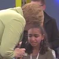 Merkel explains 'tough' asylum policies to crying girl