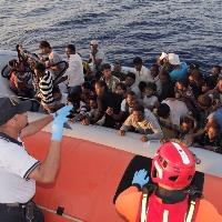 Boat migrants in EU's hands as Italy weighs future of rescue mission
