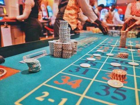 Gambling table - Photo by Kay on Unsplash.jpg