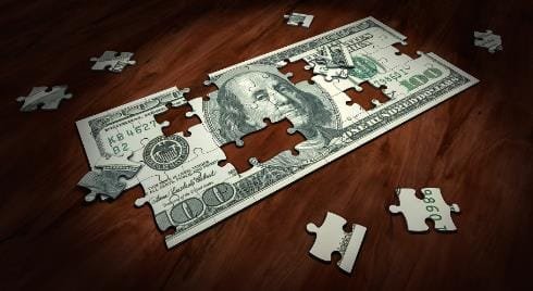 Dollar jigsaw - Image by Arek Socha on Pixabay