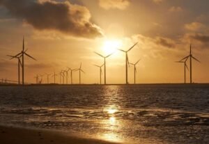 Wind turbines sunset - Image by Bruno from Pixabay