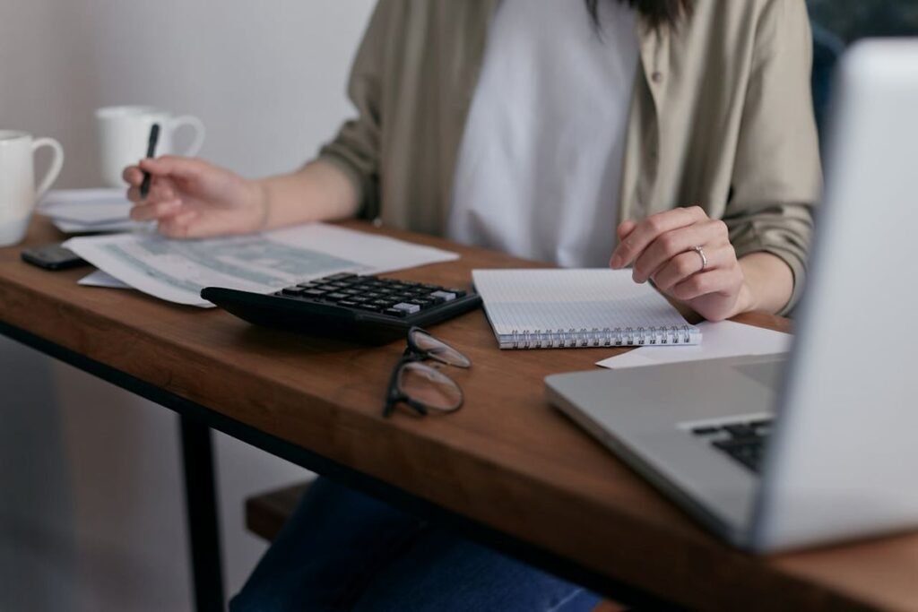 Business accounting - Photo by Mikhail Nilov on Pexels