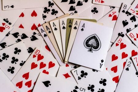 A pile of playing cards sitting on top of each other.