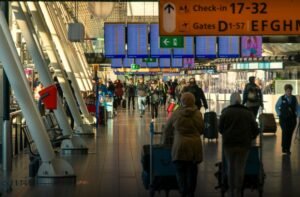 Euro-Parliament greenlights new EU rules on package travel Airport terminal - Photo by Pim de Boer on Unsplash